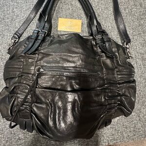 Botkier black soft lambs leather.